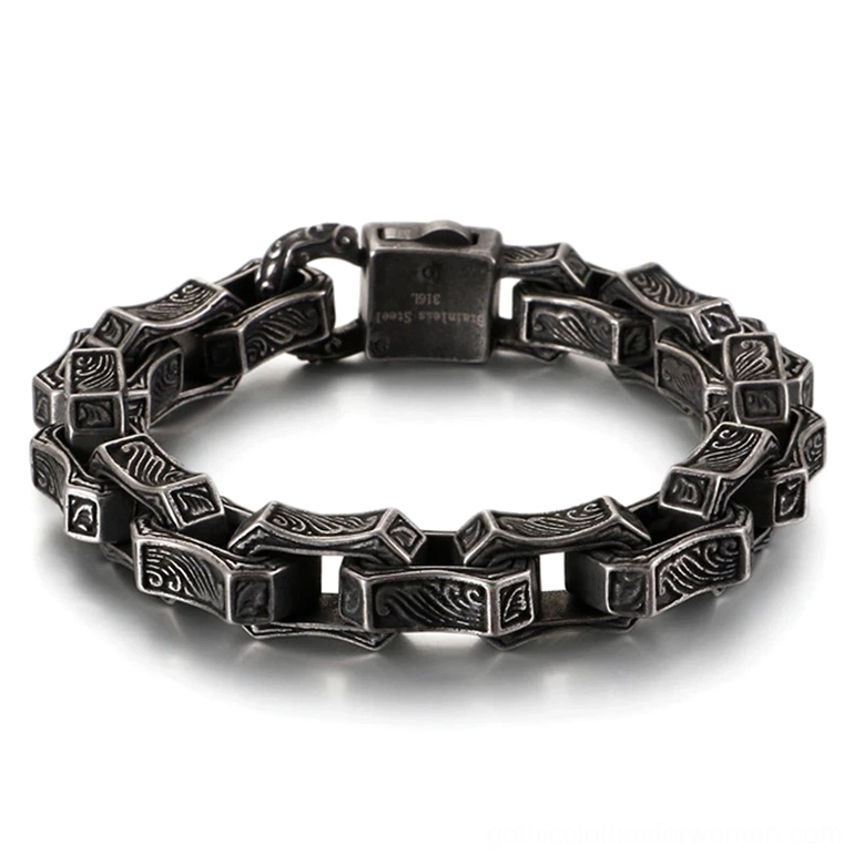 Dark gray gothic engraved square link stainless steel cuff bracelet overhead flat lay view with antique silver finish