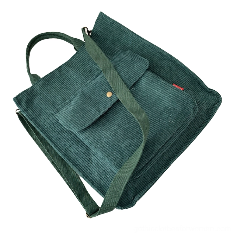 Dark green corduroy gothic tote bag with mystical forest green shade, side view showing premium fabric texture and adjustable strap details