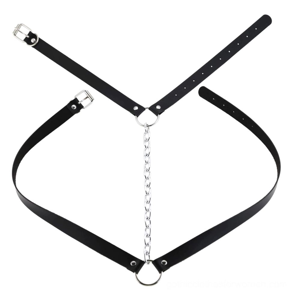 Dark colored vegan leather body harness with metal chain hardware and adjustable straps