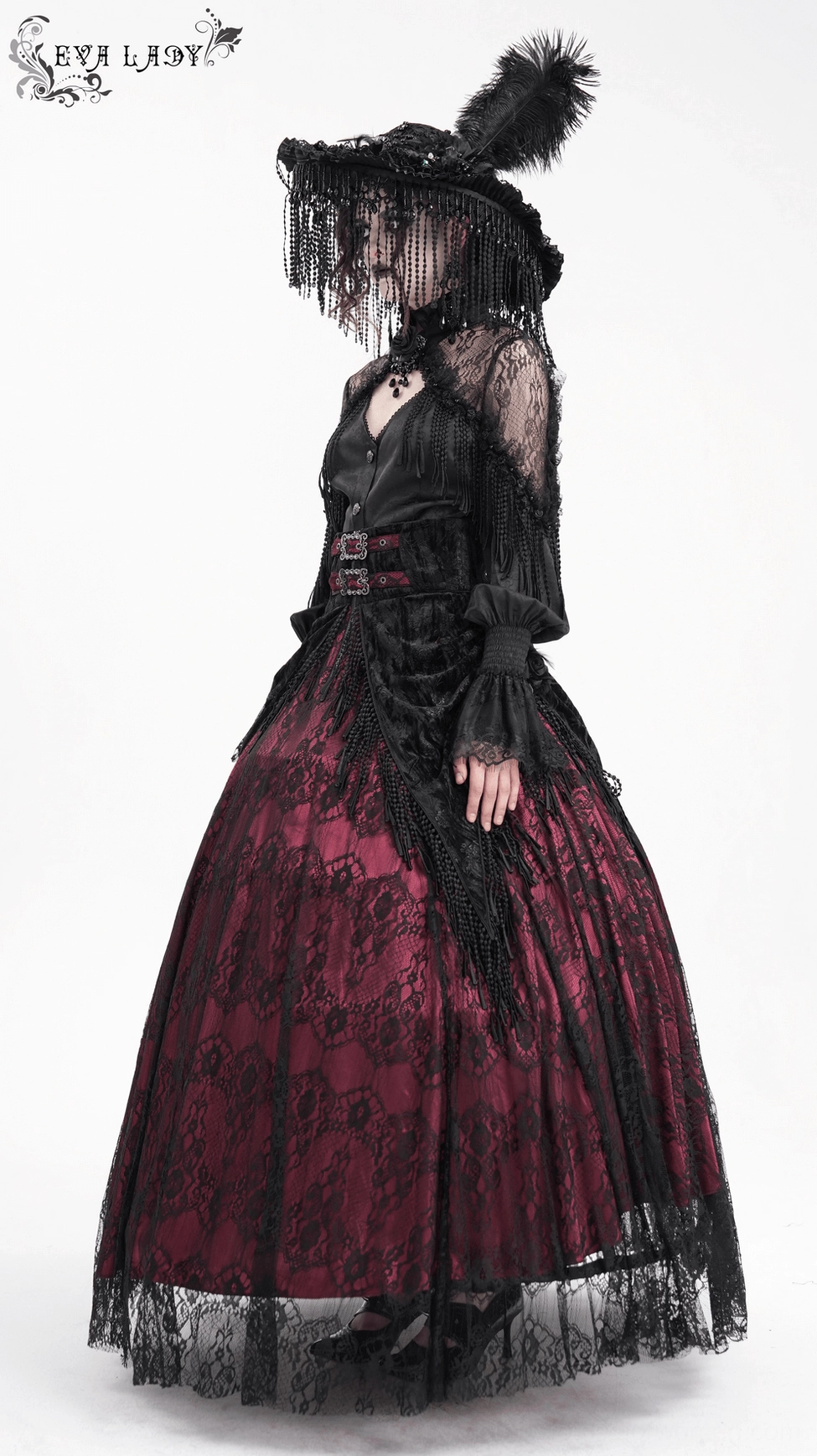 Dark romantic gothic skirt showcasing wine red burgundy color, black lace overlay, tassel embellishments, and ornate buckle hardware