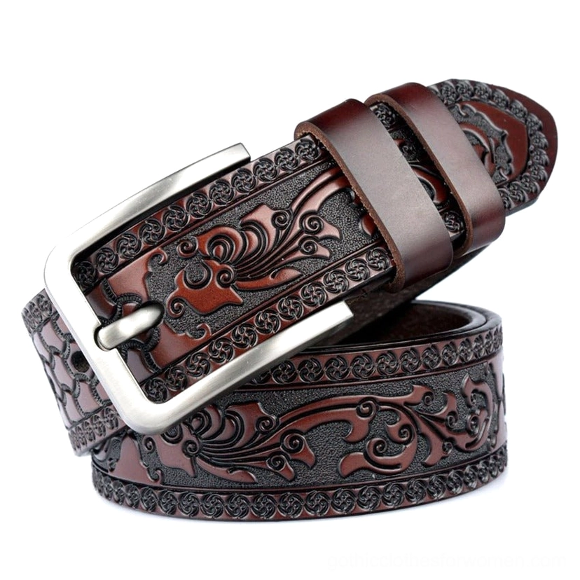 Deep brown embossed gothic leather belt with intricate floral carving and antique silver buckle, showing authentic leather texture