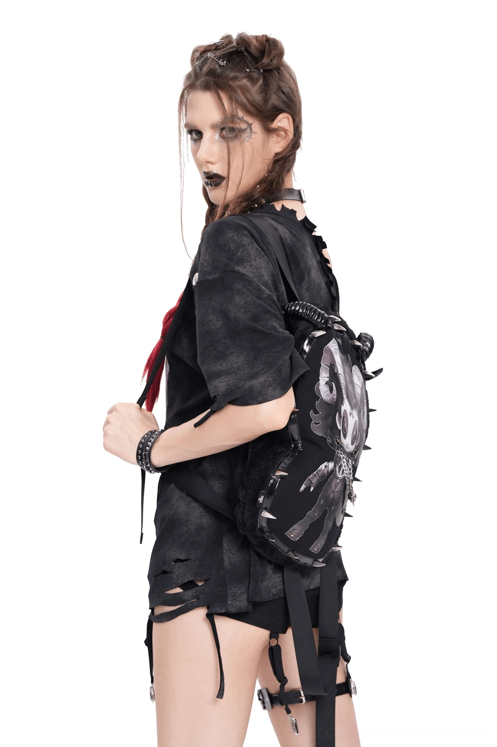 Side rear view of demon-themed gothic backpack showing fuzzy black fleece fabric and adjustable shoulder straps