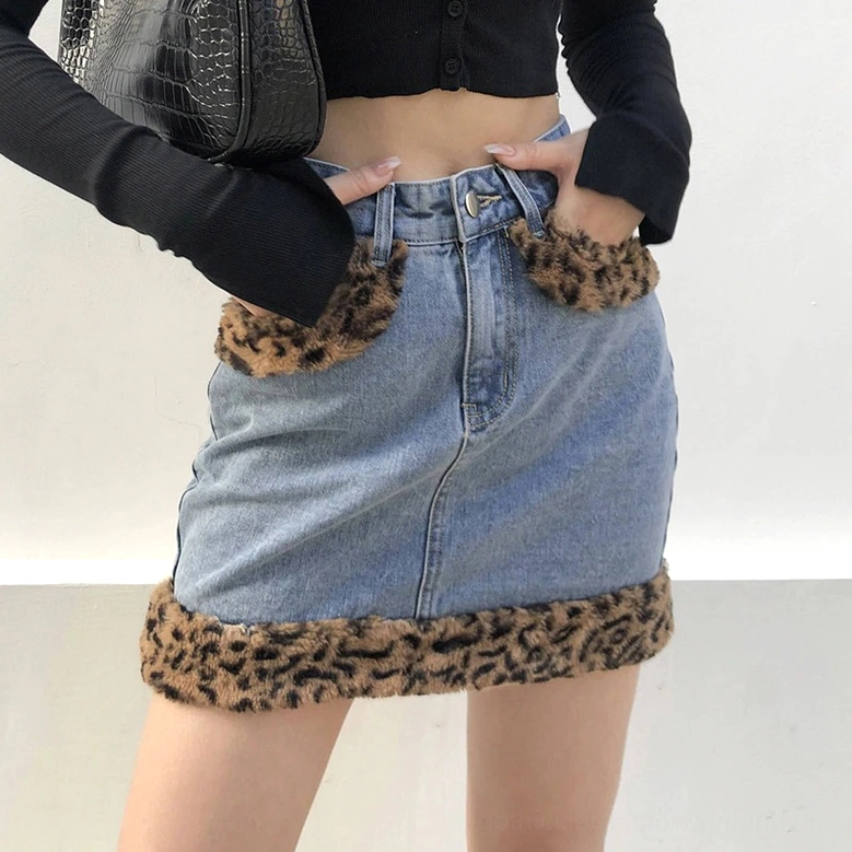 Denim mini skirt brown and off-white leopard fuzzy trim full-length worn view
