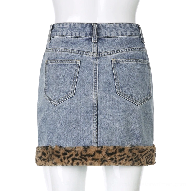 Denim mini skirt back flat view, light wash with double rear pockets and leopard fuzzy hem