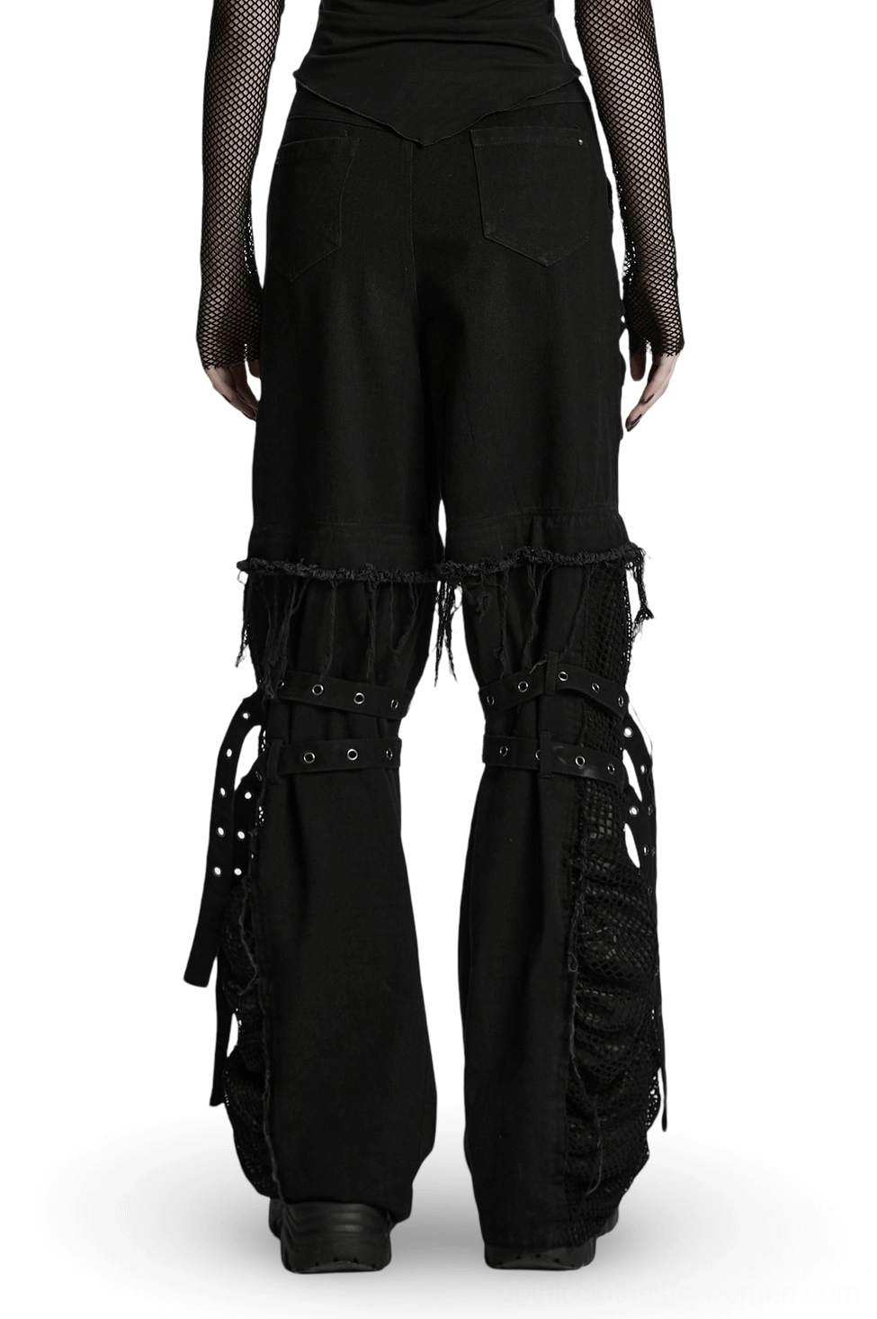 Detachable gothic pants featuring frayed hems and mesh details, rear full-length view