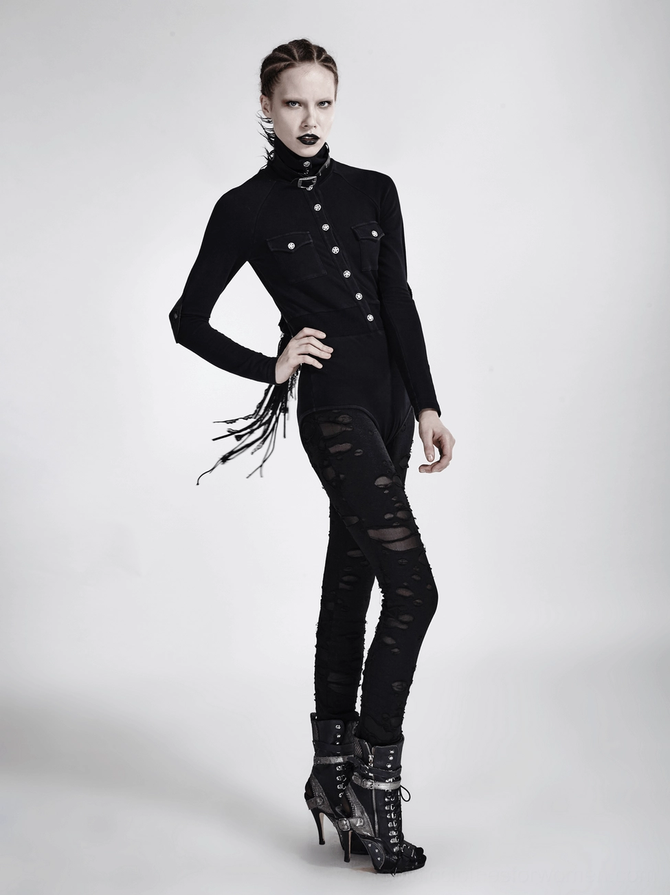Black distressed gothic mesh leggings showing transparent mesh elements and fabric quality