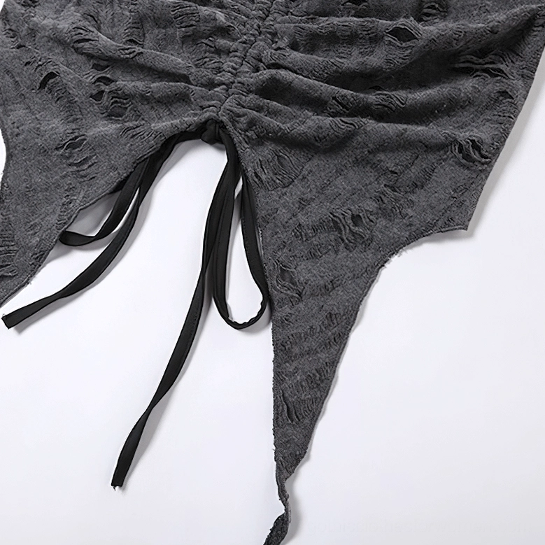 Close-up flat view of drawstring asymmetric hem and distressed fabric texture of gray halter crop top - gothic top adjustable hem detail