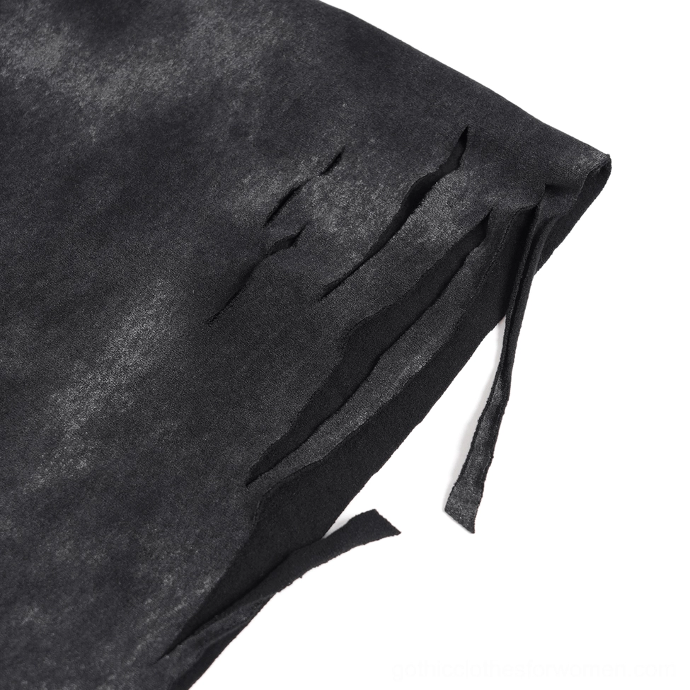 Close-up texture detail of distressed demon graphic tee showing frayed ripped hem and soft viscose fabric