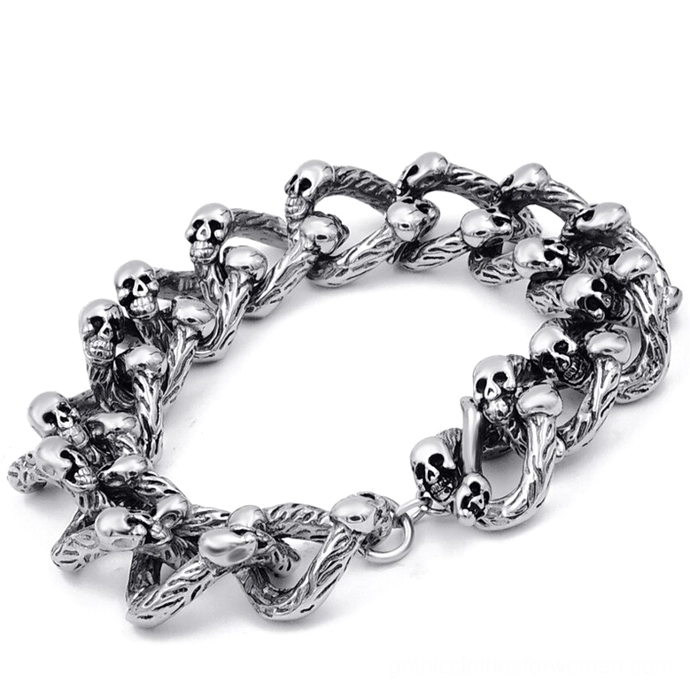 Heavy curb chain skull bracelet with multiple skeleton motifs integrated into links, antique silver tone flat lay