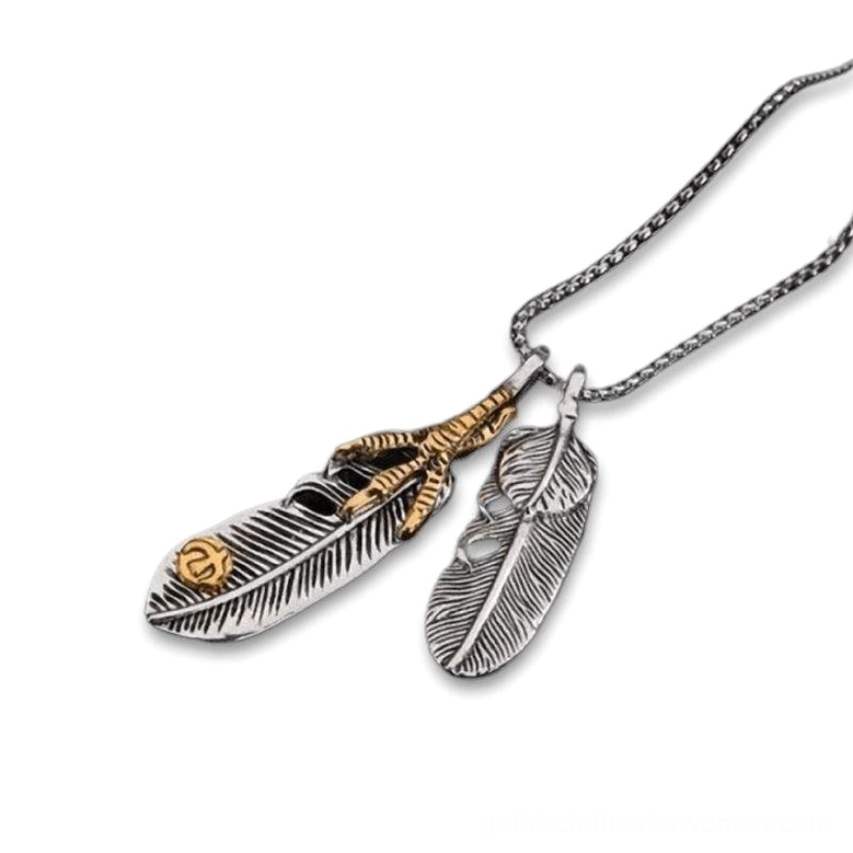 Eagle claw feather pendant necklace side view - dual feather gothic charm with vintage gold finish on dark background