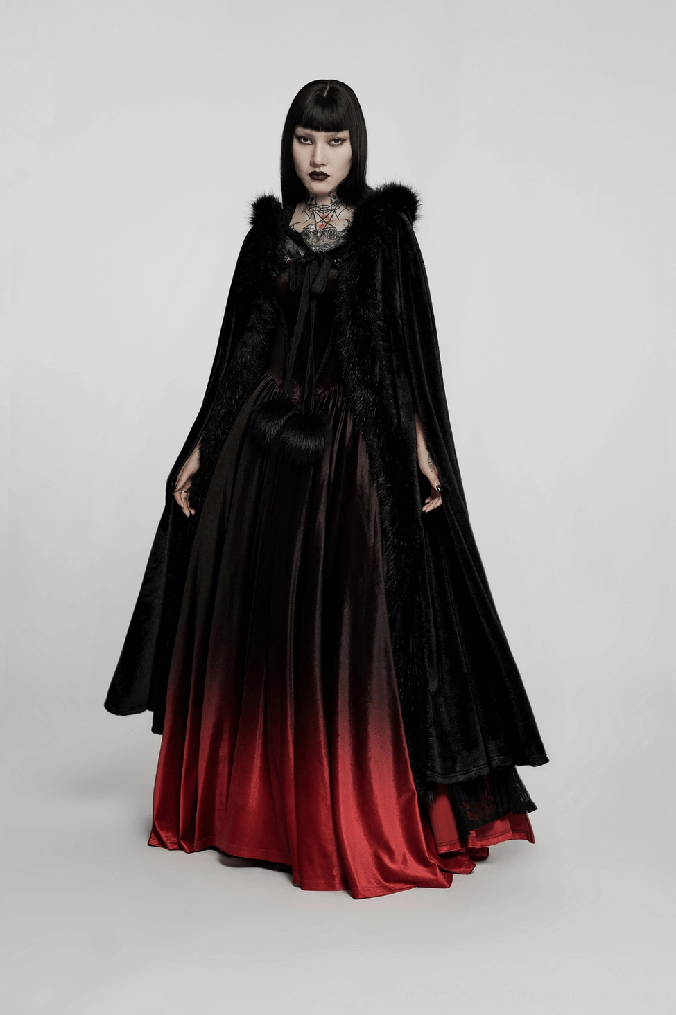 Front view of elegant black Gothic faux fur velvet long cloak with hood and ornate straps