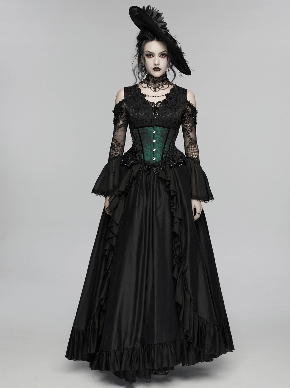 Emerald green jacquard gothic underbust corset displayed flat, front view showing full rose pattern and decorative beaded hem
