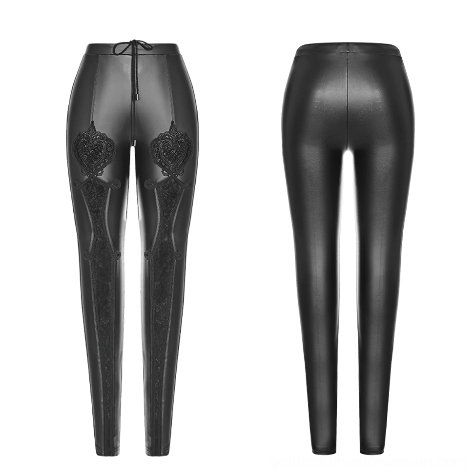 Black faux leather leggings flat lay showing heart-shaped lace embroidery and drawstring waist detail