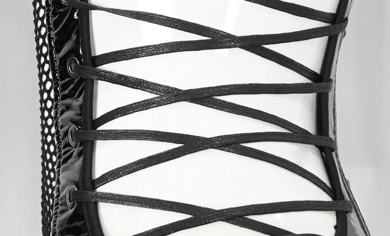 Fishnet mesh bondage bodysuit with studs and patent leather - flatlay or detail perspective