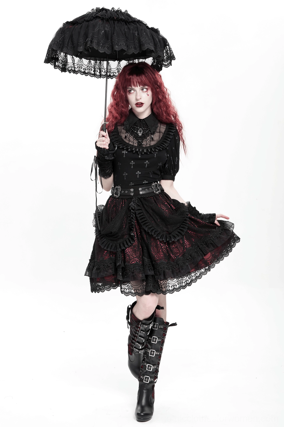 Full-length view of black lace gothic skirt with crimson underskirt showing through layered construction