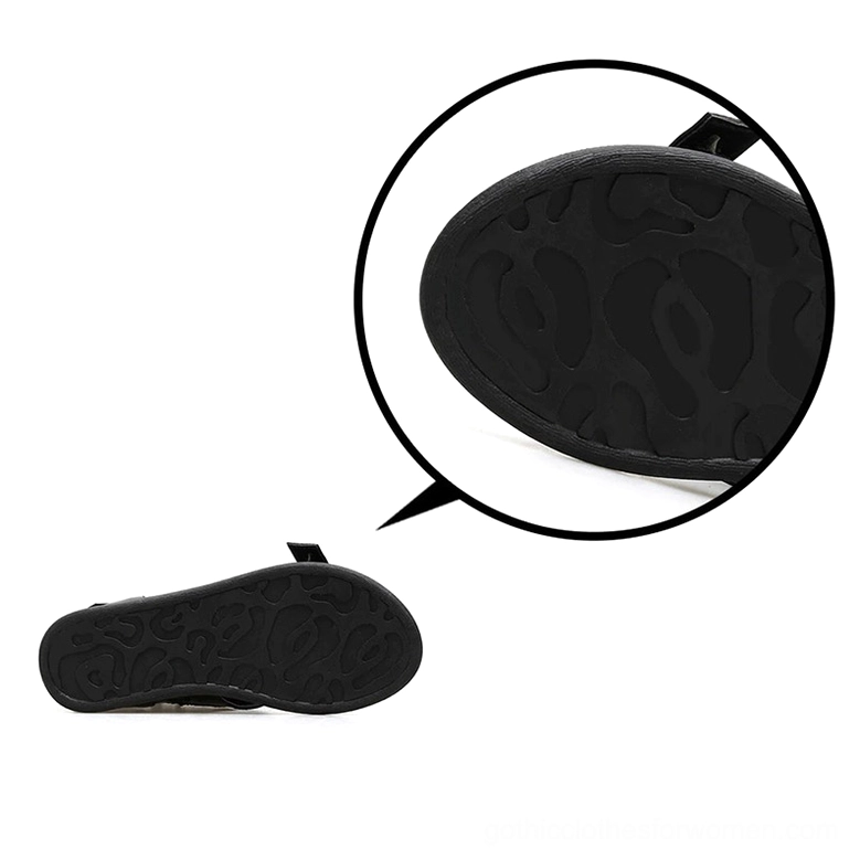 Bottom view of gladiator sandal showing anti-slip patterned black rubber outsole and sole construction