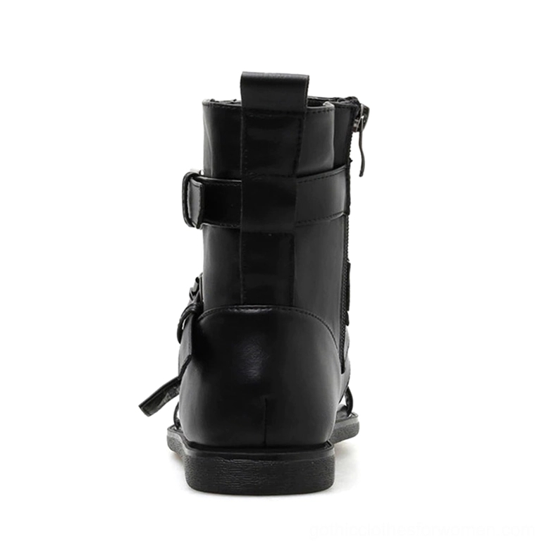 Rear view of black gladiator sandal showing back zipper closure, heel pull tab, and ankle strap construction