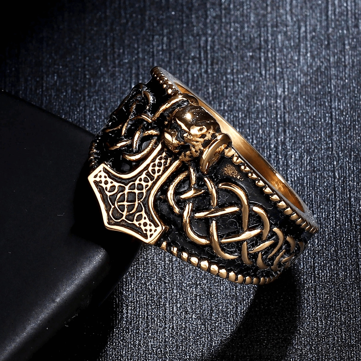 Mixed-tone stainless steel Thor's hammer ring with gold-black finish and engraved Celtic knot pattern