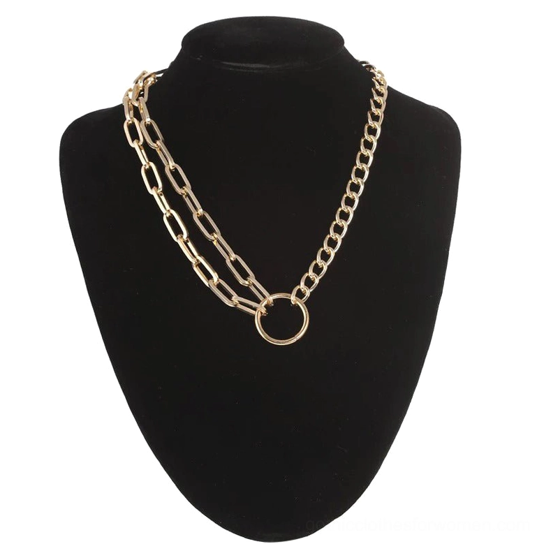 Gold layered geometric chain choker necklace with circle ring pendant, worn on black jewelry mannequin, front view showcase