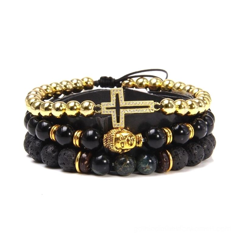Gold-toned layered gothic bracelet set featuring natural mixed stone beads, Buddha head charm, cross accent and metallic details