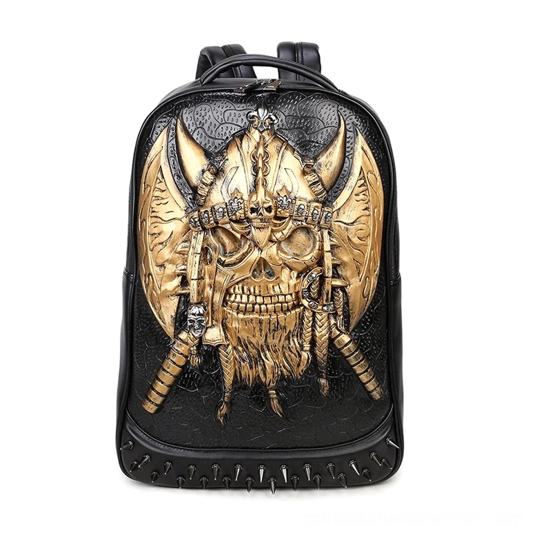 Gold accented gothic skull backpack with gold embossed decoration and riveted trim on black leather