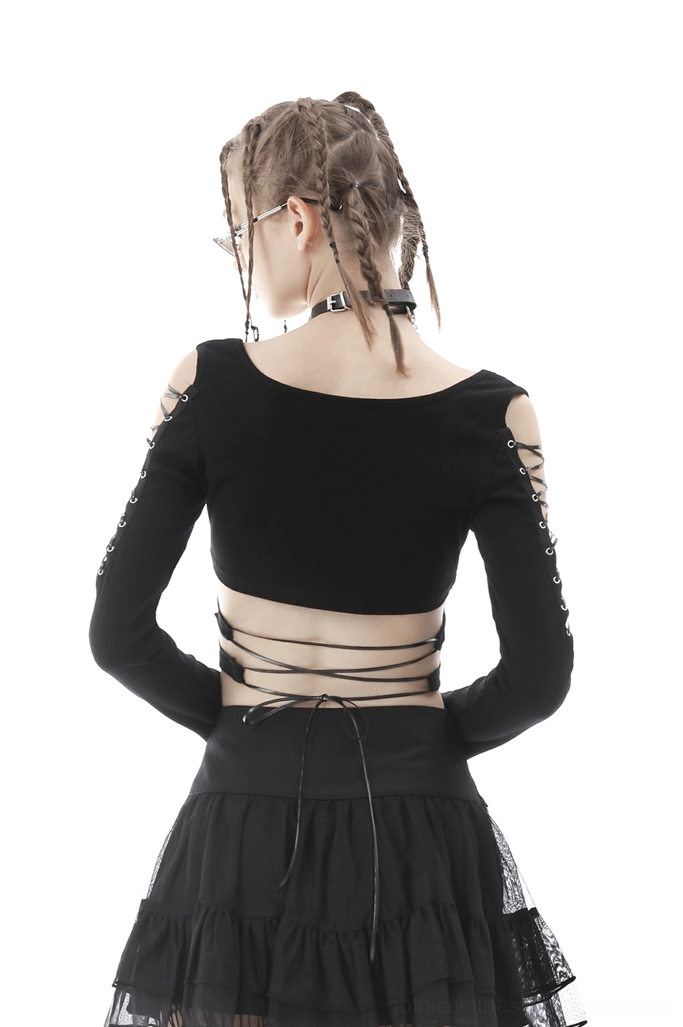 Black gothic crop top back lace-up strap design with cold shoulder detail, paired with mini skirt on model