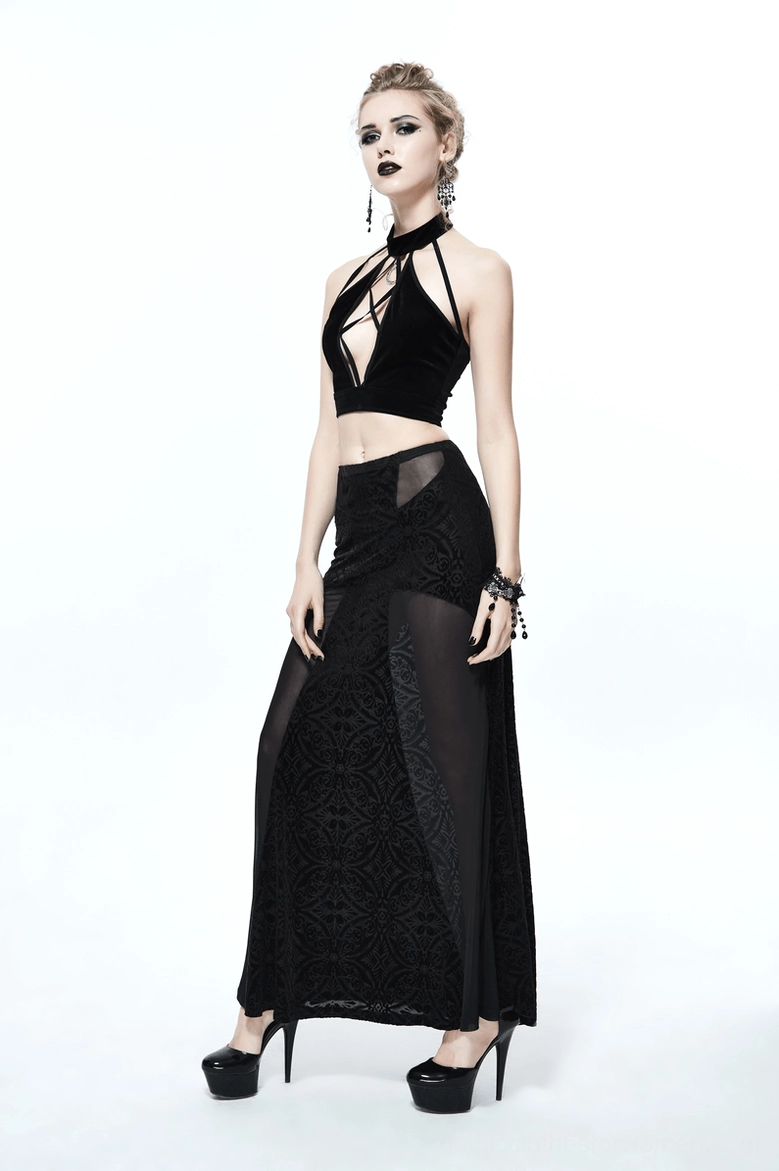 Black velvet halter crop top with sheer lace skirt on model, side full-body view with platform heels, gothic alternative styling