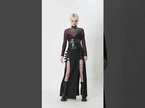 Gothic corset belt styled with high slit skirt and fishnet tights, alternative fashion half-body presentation
