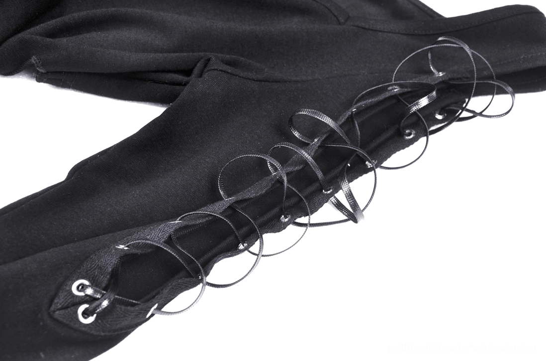 Gothic batwing crop top styled with high-waisted black pants for punk-rock alternative fashion look