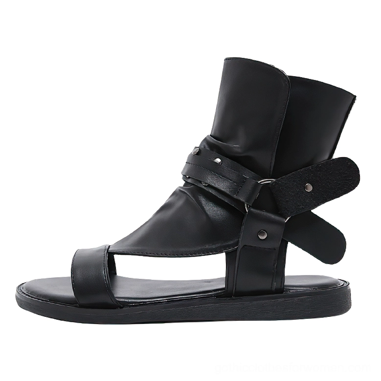 Black gothic ankle strap sandal right side view showing ankle cuff design and flat sole construction