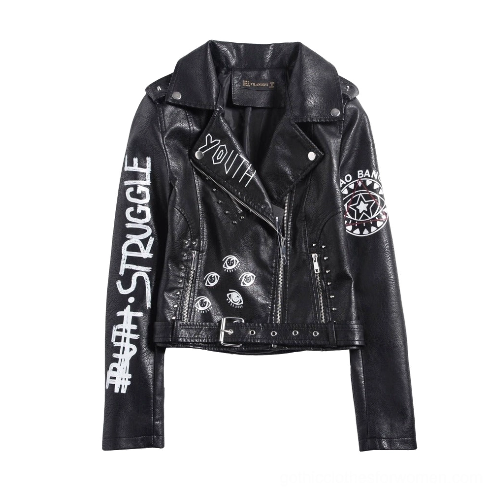 Three-quarter front perspective of black faux leather jacket with complete decorative patch placement and stud embellishments