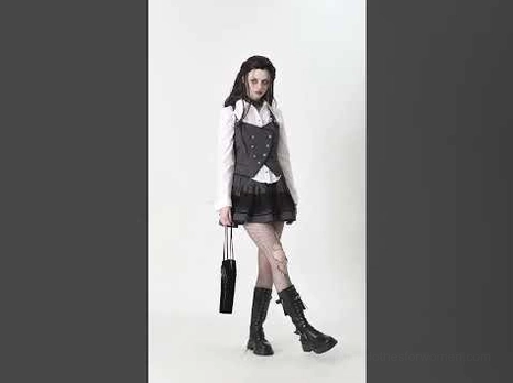 Full body gothic model styling coffin shoulder bag with layered skirt and gothic boots dark aesthetic