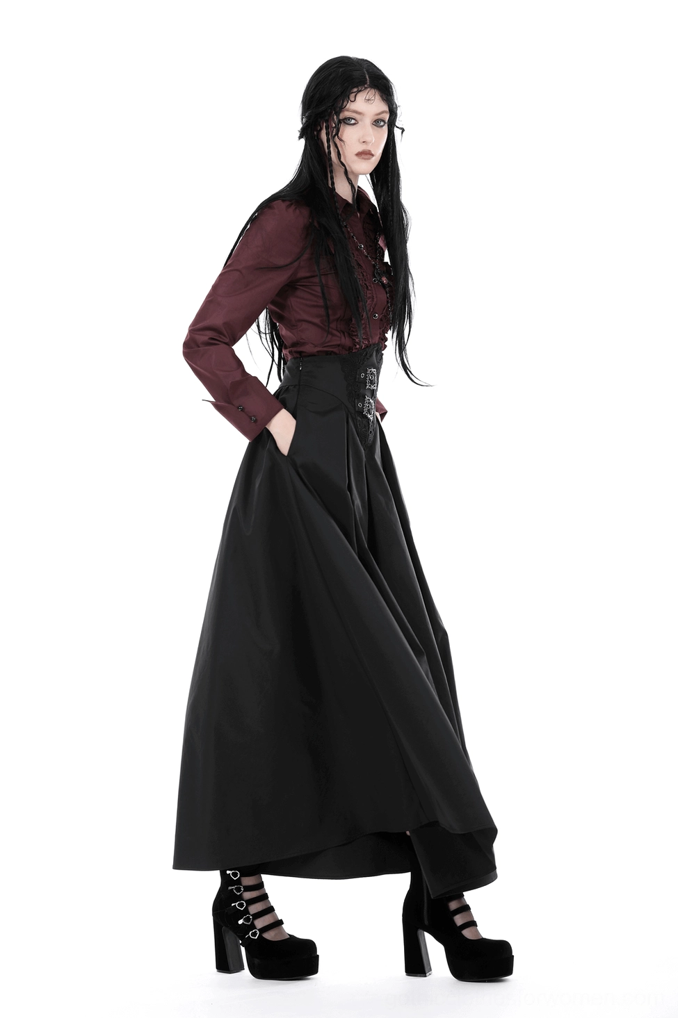 Full-length view of black A-line gothic skirt showing floor-length hem and high-waisted corset silhouette