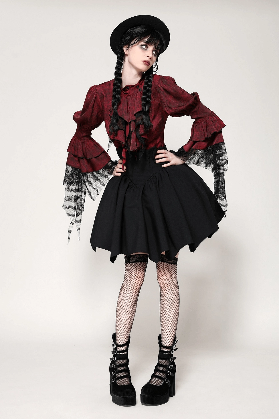 Black gothic A-line mini skirt showing corset-inspired structure and waist detail