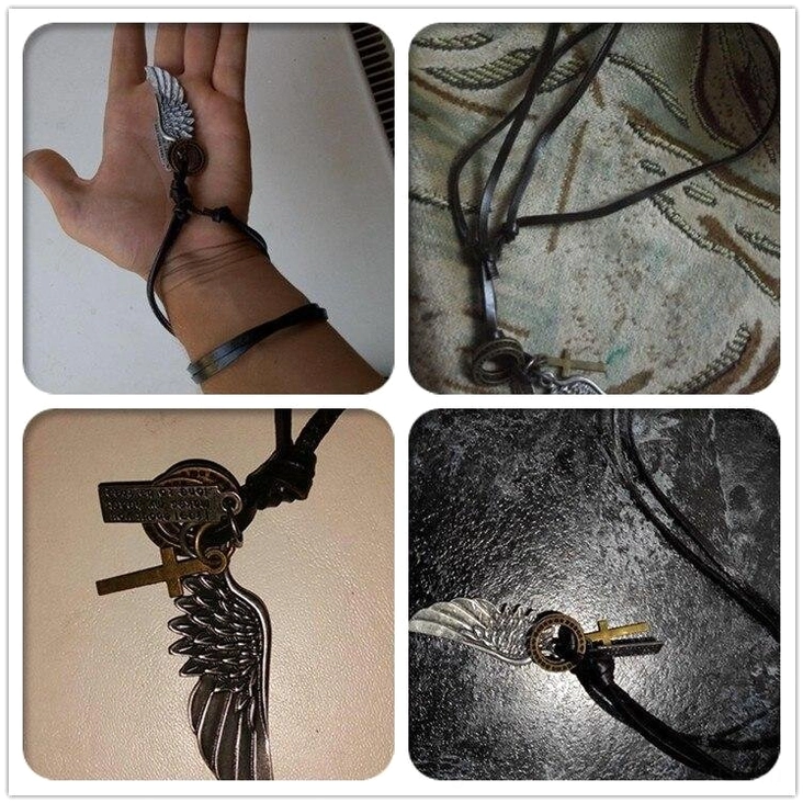 Black leather adjustable gothic angel wing choker necklace with full silver-toned multi-charm ensemble, complete view