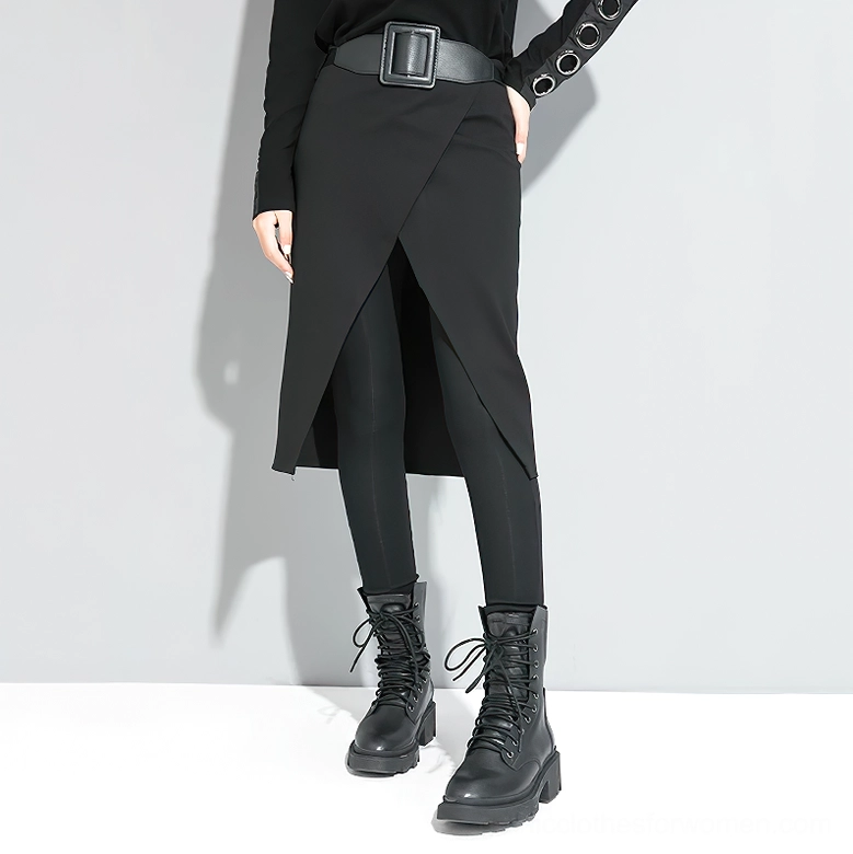 Women's black gothic split pants with fitted inner leggings - front side view showing silhouette and design details