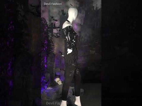 Gothic alternative fashion mannequin display set featuring black slim-fit pants with punk aesthetic details