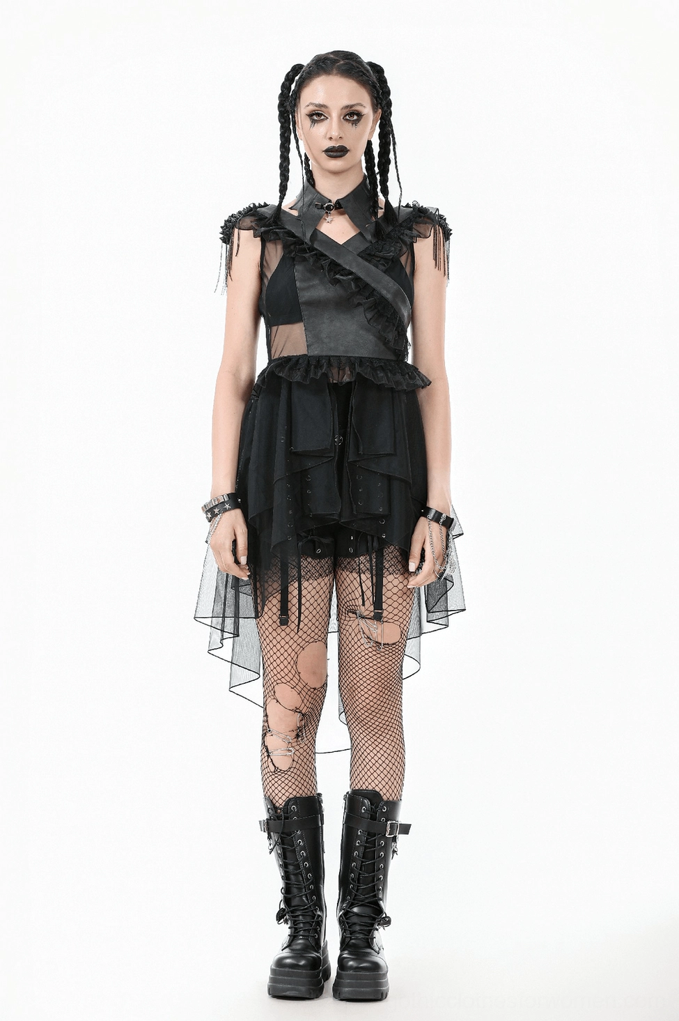 Black gothic alternative fashion dress showcasing the dramatic tiered tulle construction and off-shoulder ruffle design