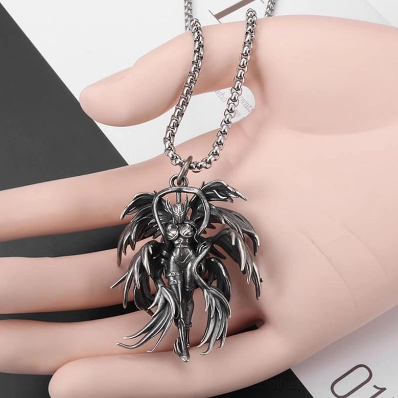 Gothic angel pendant necklace worn on hand model - shows scale and wearable proportions of pendant and chain