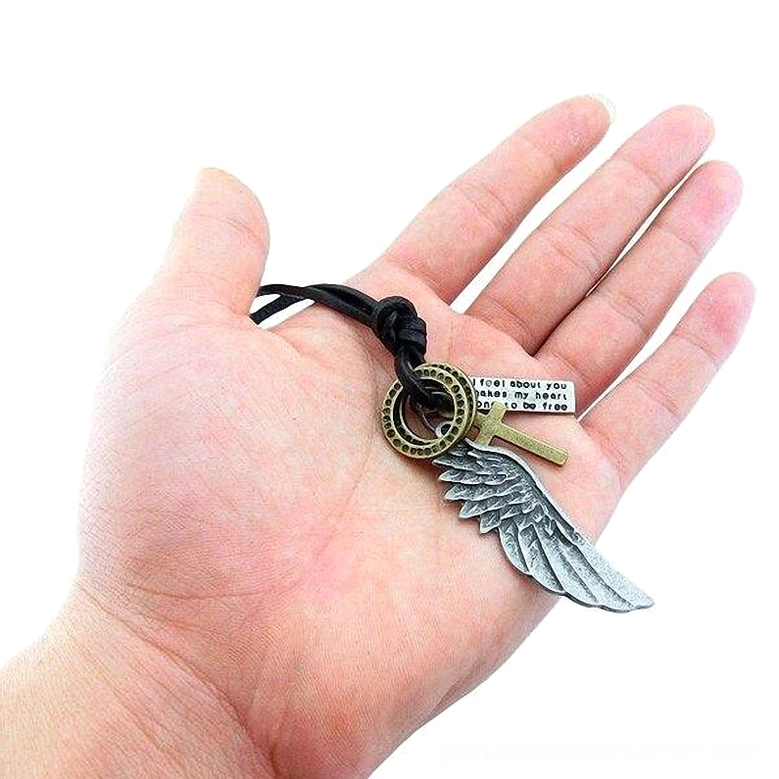Dark gothic angel wing leather choker necklace with silver-toned charms and symbolic text pendants, flat lay presentation