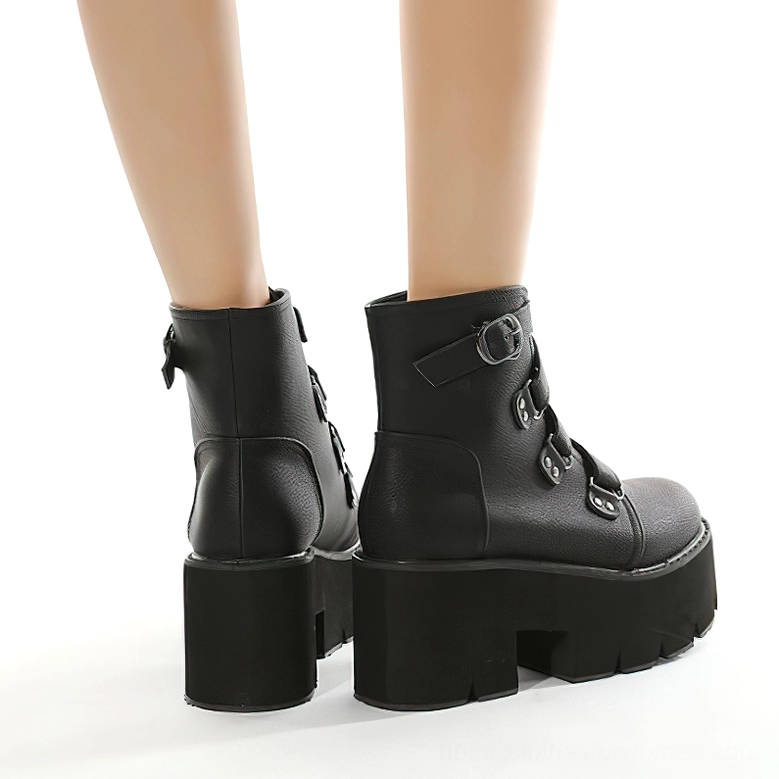 Model wearing gothic platform boots rear leg view displaying block chunky heel and back buckle strap styling