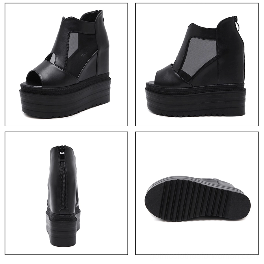 Left side three-quarter angle view of black gothic platform ankle boots with peep-toe and mesh panels