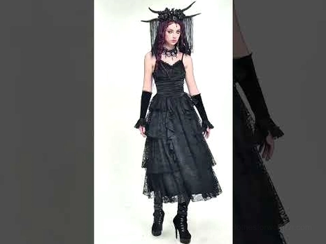 Side profile of gothic arm warmers paired with dark horned headdress and gothic gown for authentic goth styling