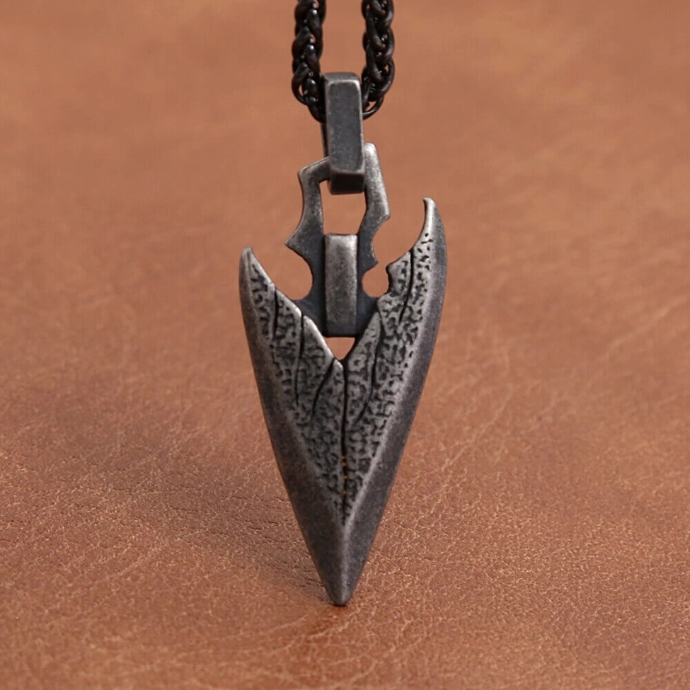 Dark silver arrowhead pendant clasp and chain detail - stainless steel jewelry construction