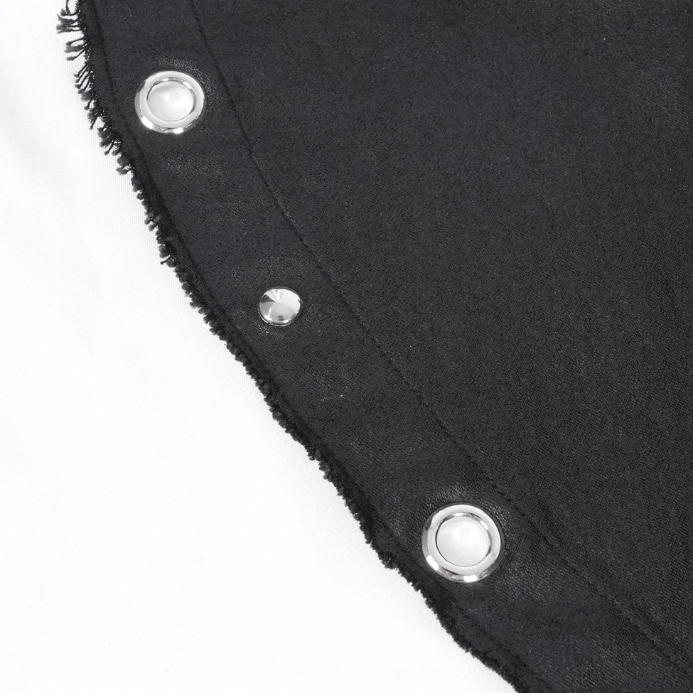 Detailed view of gothic dress construction showing stitched seams and metal hardware placement on black fabric