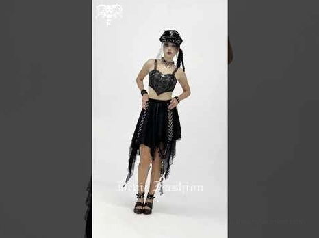 Black gothic asymmetric lace midi skirt angled front view, highlighting contrast chain trim and sheer lace tassel hem detail