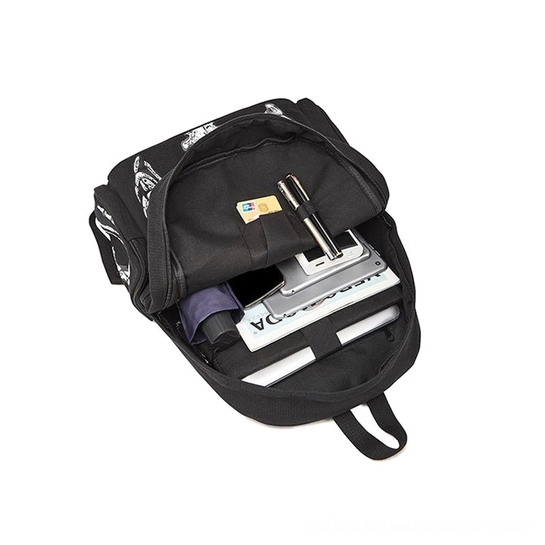 Interior view of gothic backpack showing multiple storage compartments and zippered pockets