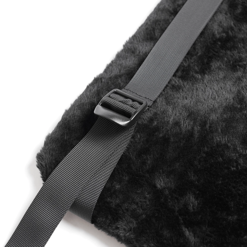 Shoulder strap adjuster close-up on gothic demon backpack showing adjustable nylon strap with plastic buckle mechanism and plush fabric backing