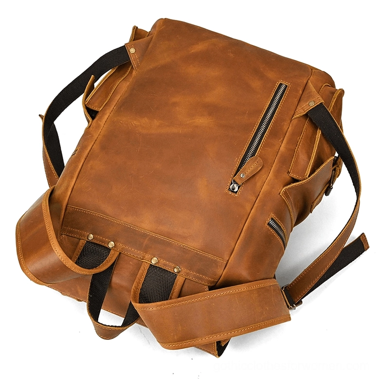Gothic vintage leather backpack adjustable shoulder strap close-up