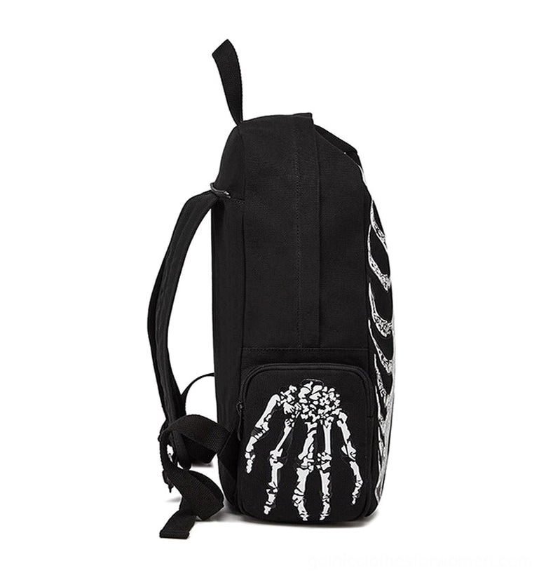 Skeleton hand print detail on side pocket of dark gothic canvas backpack